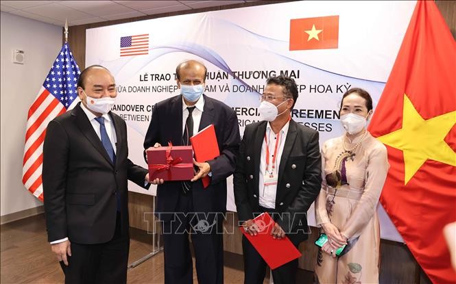 President witnesses US Quantum Group’s deal with Vietnamese joint venture - ảnh 1