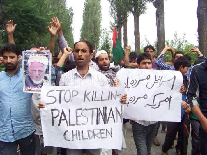 1405239222-kashmiri-muslims-protest-against-israel-for-killing-children-in-gaza_5249643.jpg