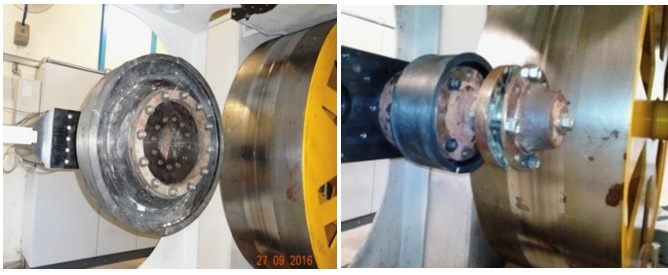 (a) Composite road wheel and (b) composite top roller assembled on the static load test rig..jpg