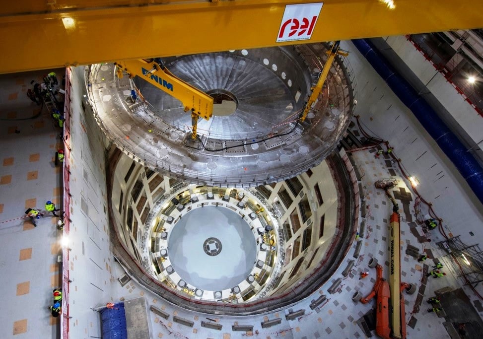 Cryostat Base Section being lowered in the Tokamak pit.jpg