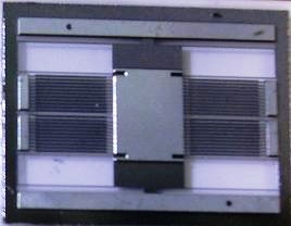 MEMS Sensors with scanning electron microscope (SEM) image showing fine details2.jpg