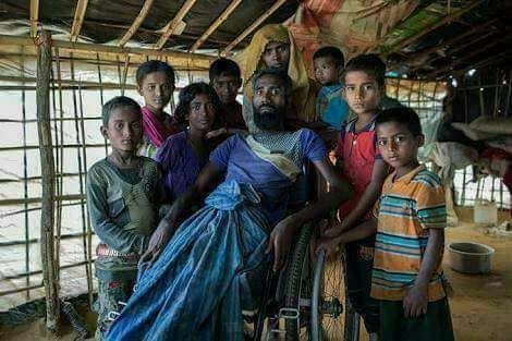Rohingya viklang and 12 kids.jpg