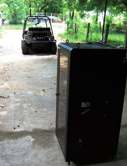 UGV based on All Terrain Vehicle (ATV) and the base station.jpg