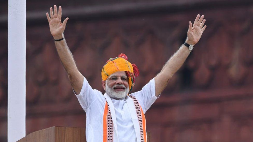 India's Prime Minister Narendra Modi waves at the crowd during a ceremony to celebrate country's 73rd Independence Day, which marks the of the end of British colonial rule, at the Red Fort in New Delhi on August 15, 2019.